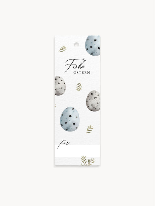 8 Geschenkanhänger mit Ostereier-Motiv, Aufschrift „Frohe Ostern“, Namenszeile, Lochung zum Anhängen.