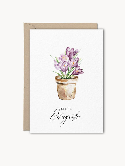 Grußkarte „Liebe Ostergrüße“ mit Krokus-Aquarell auf Naturkarton, inklusive Kraftpapier-Umschlag – ideal für Ostergrüße, Geschenkbeilagen oder Frühlingspost.