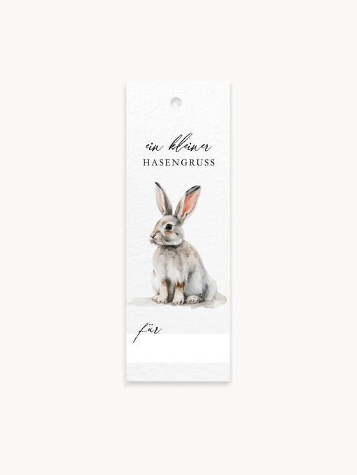 8 Geschenkanhänger mit Osterhasen-Motiv, Schriftzug „Ein kleiner Hasengruß“, Namenszeile, Lochung.