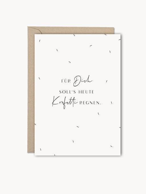 Grußkarte im DIN A6 mit der Aufschrift „Für Dich soll’s Konfetti regnen.“ in modernem Schwarz-Weiß-Stil, inklusive Kraftpapier-Umschlag